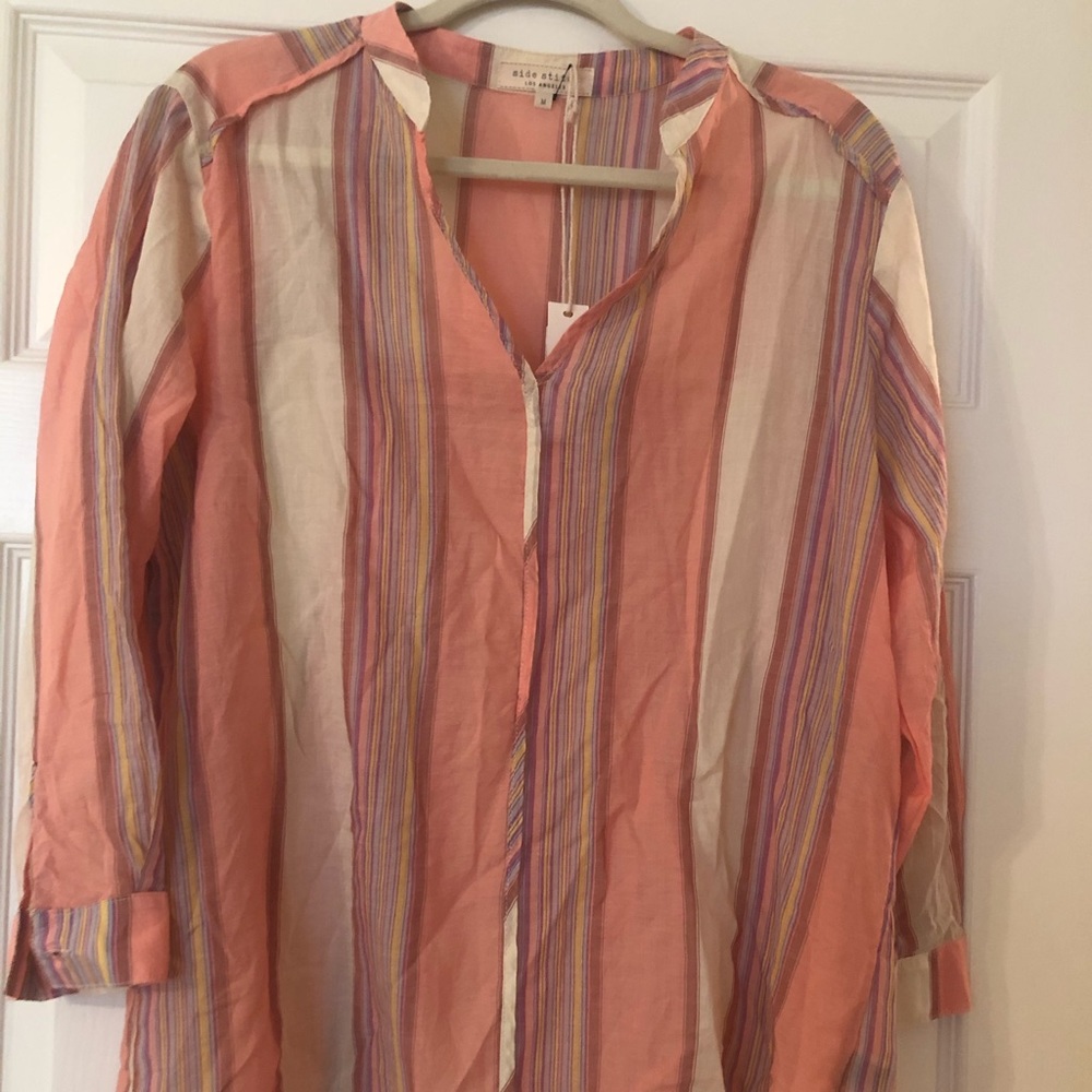 Striped pullover top with 3/4 sleeves.